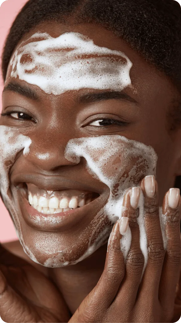 Image of a woman washing her face