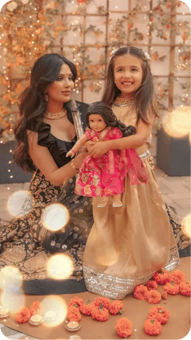 Ethnically diverse family influencers posing with their American Girl dolls
