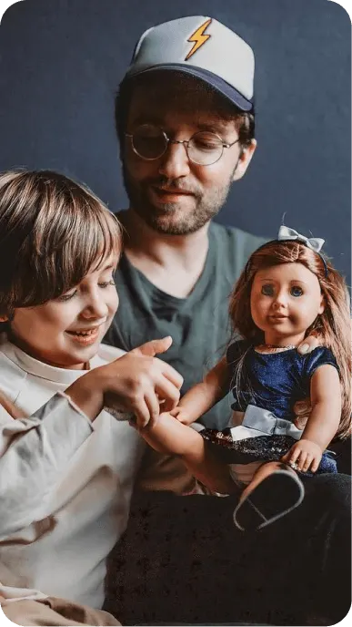 Family influencers playing with their American Girl dolls