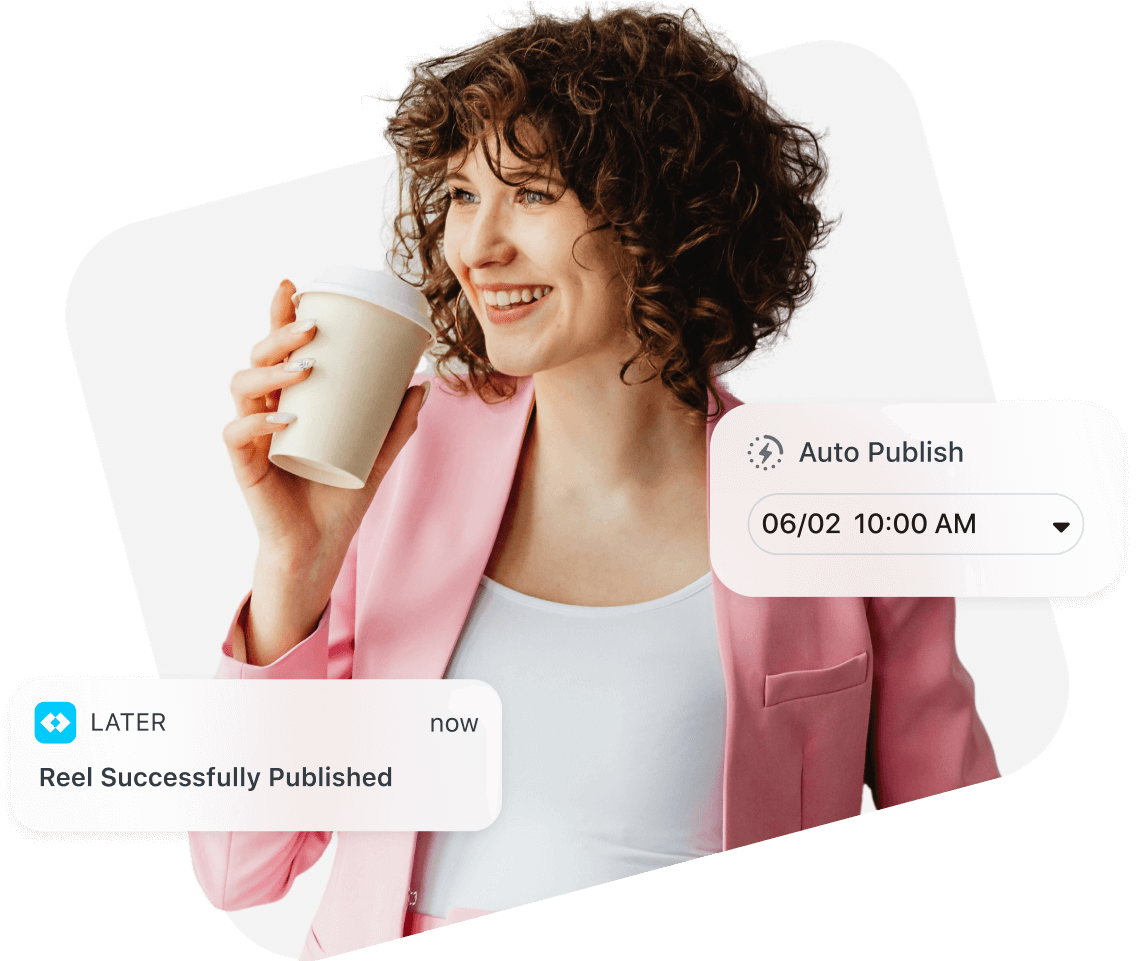 Curly haired woman in a pink blazer smiles while her Instagram reel is auto posted using Later Auto Publish