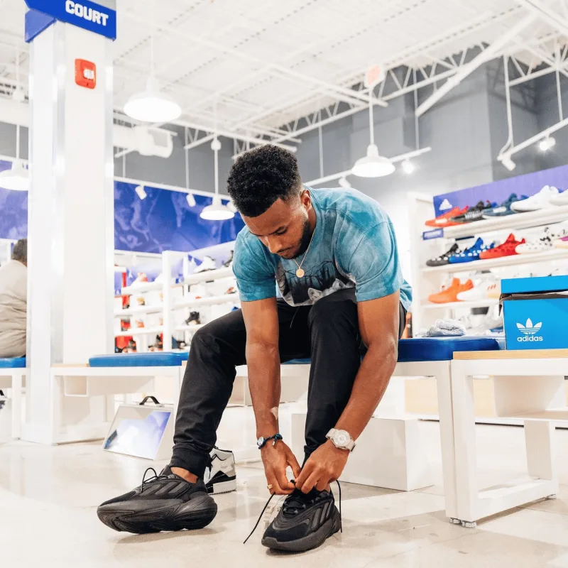 Instagram post from fitness influencers promoting Champs Sports for the Weekend Warriors campaign