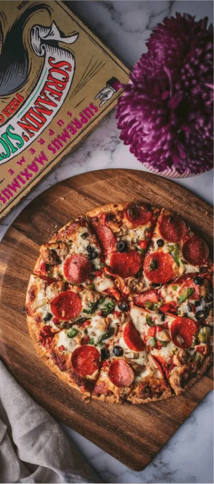 A supreme pizza from Palermos next to key campaign results